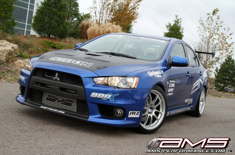 AMS Performance 08-15 Mitsubishi EVO X Front Mount Intercooler w/Modular Cast End Tanks & Logo - Crew Original