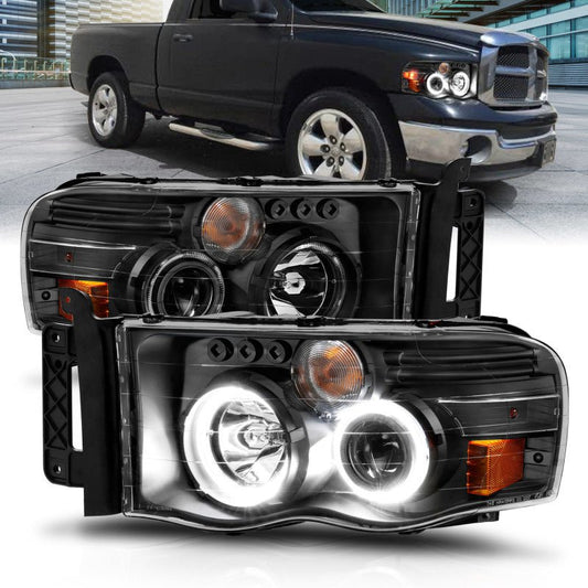 ANZO 2002-2005 Dodge Ram 1500 Projector Headlights w/ Halo Black Clear Amber - Crew Original