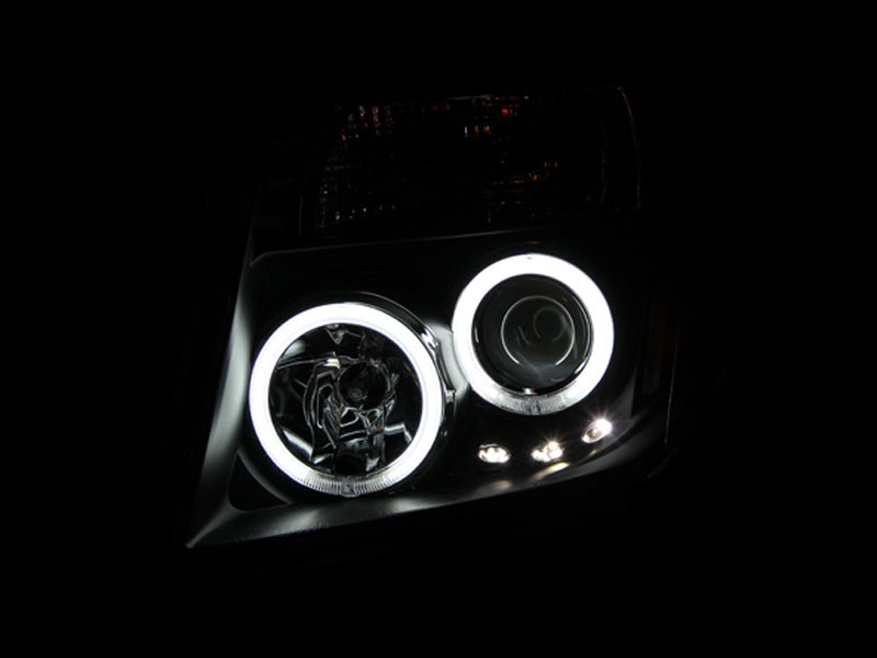 ANZO 2005-2008 Nissan Frontier Projector Headlights w/ Halo Black - Crew Original