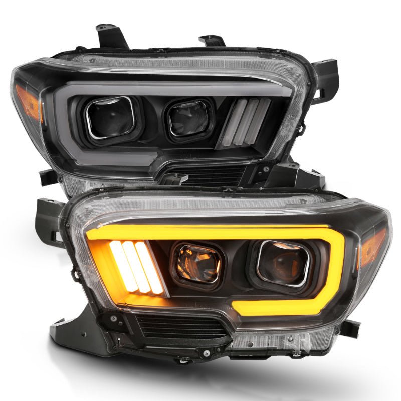 ANZO 2016-2017 Toyota Tacoma Projector Headlights w/ Plank Style Switchback Black w/ Amber - Crew Original