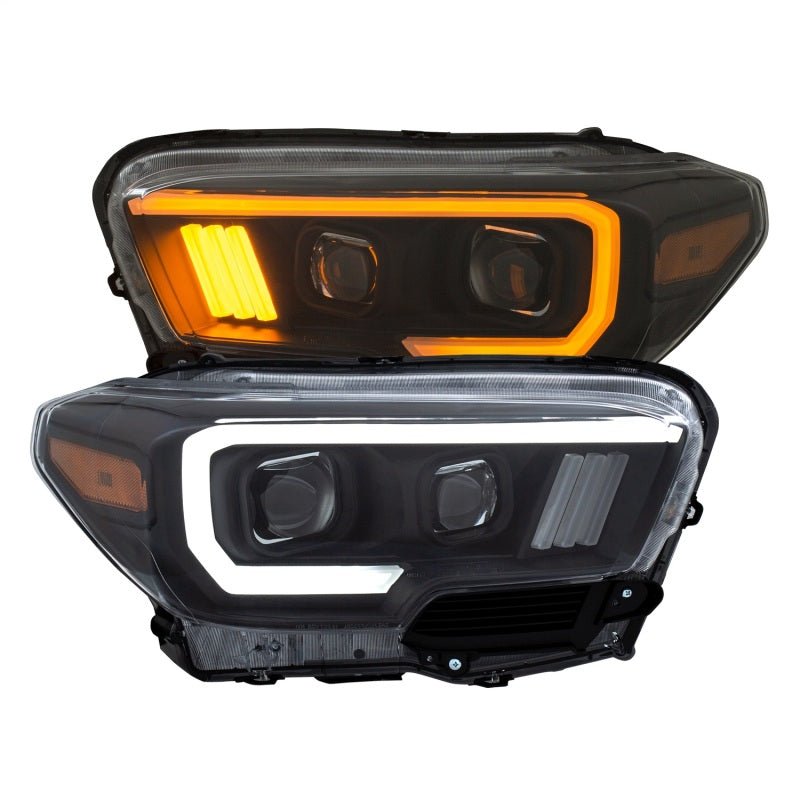 ANZO 2016-2017 Toyota Tacoma Projector Headlights w/ Plank Style Switchback Black w/ Amber w/ DRL - Crew Original