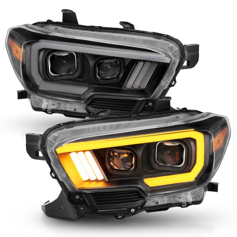 ANZO 2016-2017 Toyota Tacoma Projector Headlights w/ Plank Style Switchback Black w/ Amber w/ DRL - Crew Original