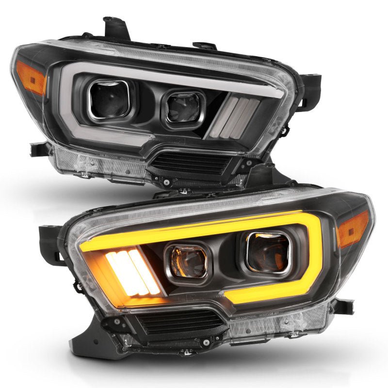 ANZO 2016-2017 Toyota Tacoma Projector Headlights w/ Plank Style Switchback Black w/ Amber w/ DRL - Crew Original