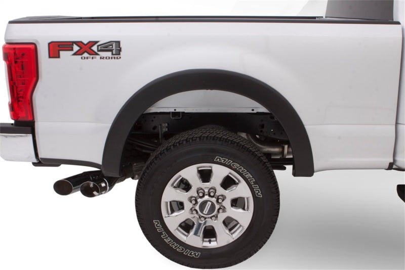 Bushwacker 00-05 Ford Excursion OE Style Flares 4pc - Black - Crew Original