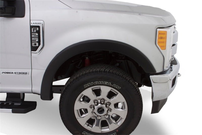 Bushwacker 16-18 Nissan Titan XD Pocket Style Flares 4pc 78.0in Bed - Black - Crew Original