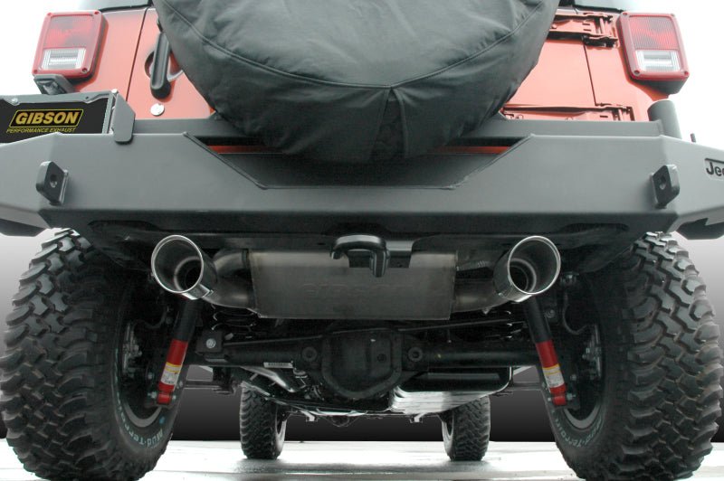 Gibson 12-17 Jeep Wrangler JK Rubicon 3.6L 2.5in Cat-Back Dual Split Exhaust - Aluminized - Crew Original